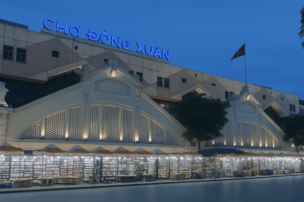 Dong Xuan Night Market is brightly lit and bustling with people